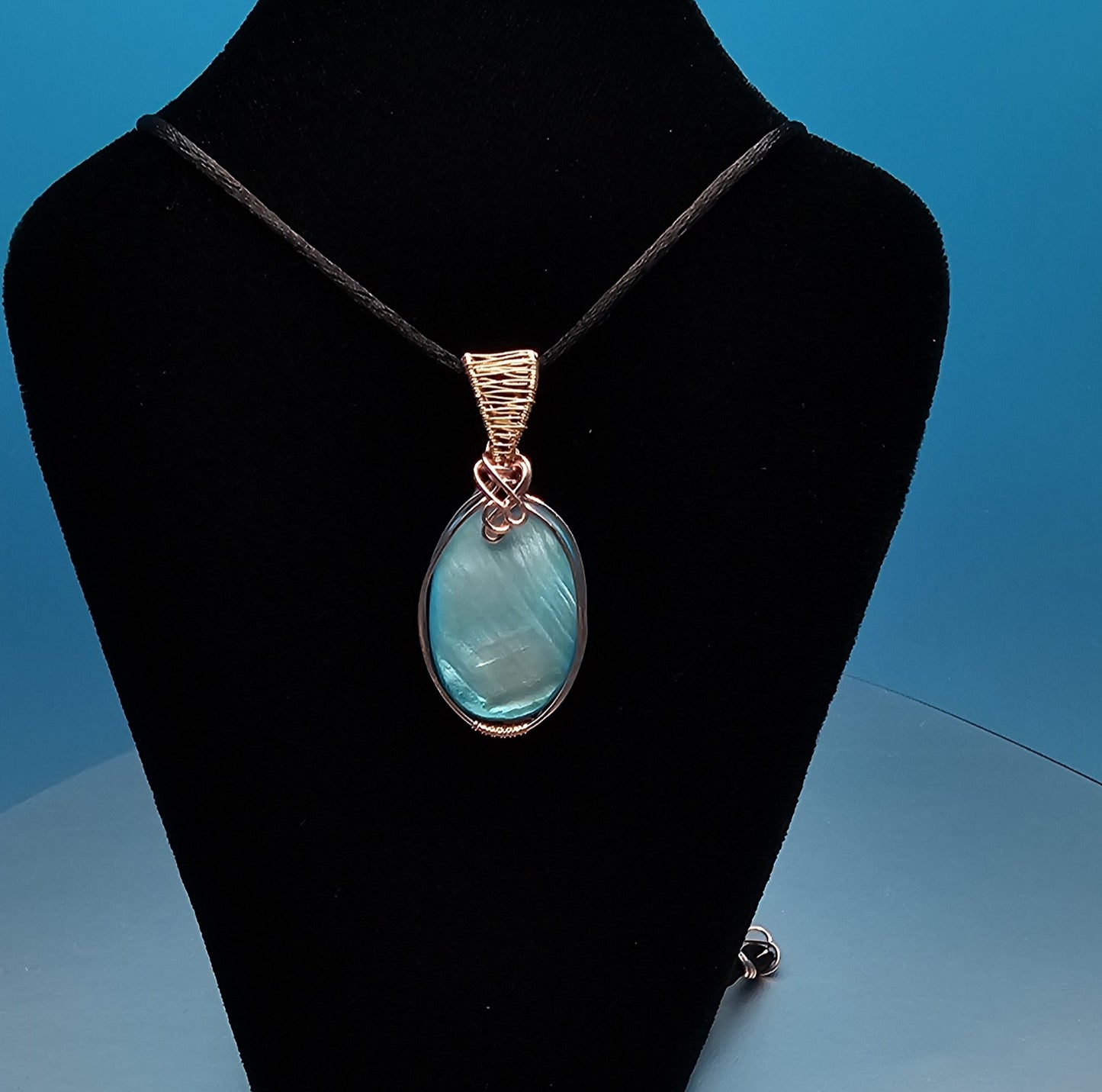 Light Blue and Rose Gold Oval Pendant